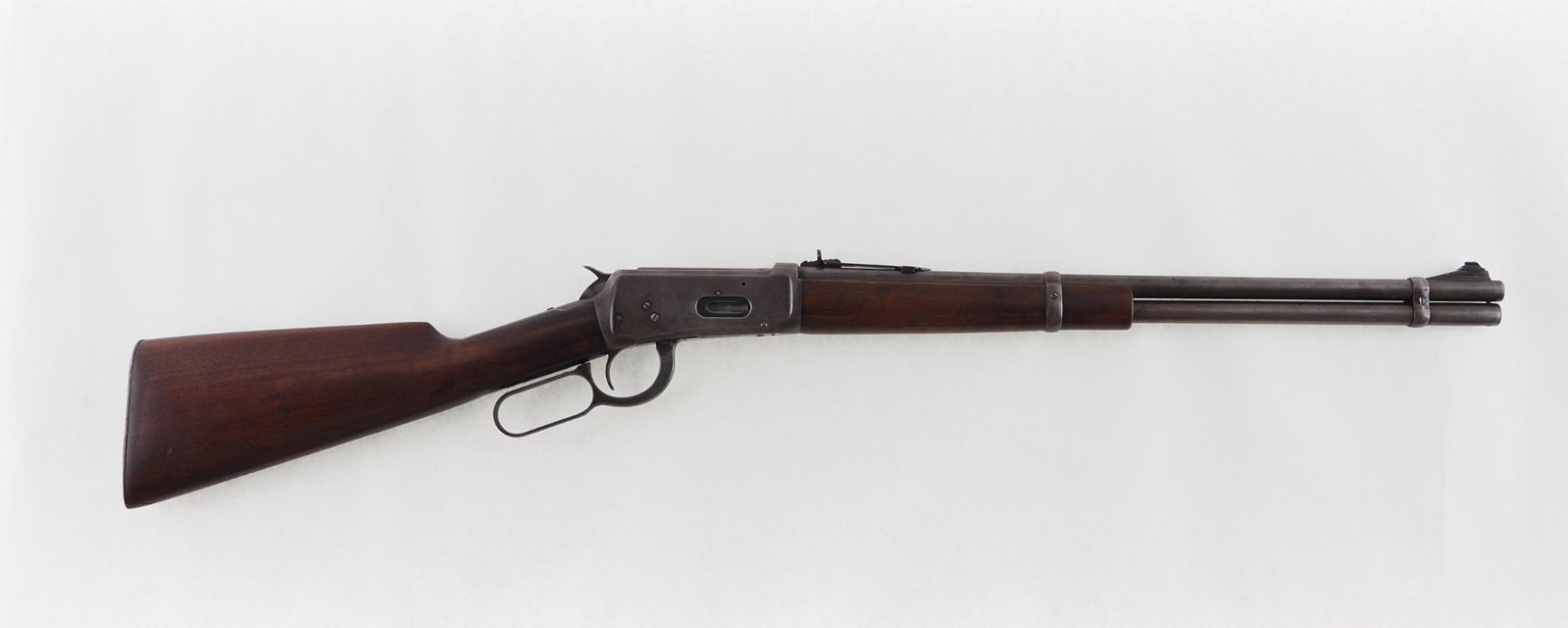 Winchester 94 Carbine: SN: 1244086 Year of Mfg: 1940 Cal: .32 Winchester Special Action Type: Lever Action Barrel Length: 20" Sights/Optics: adjustable rear sight, both newer Stock: walnut, revarnished Finish: blue mostly