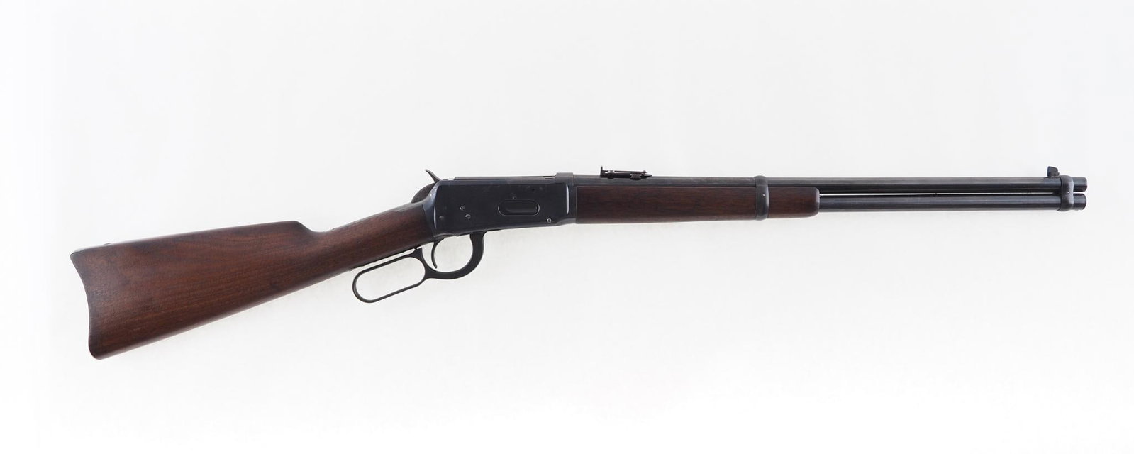 Winchester 1894 Saddle Ring Carbine: SN: 214633 Year of Mfg: 1904 Cal: .32-40 Action Type: Lever Action Barrel Length: 20" Sights/Optics: elevator rear sight Stock: walnut Finish: blue Finish Cond: older refinish Bore: very good Overall
