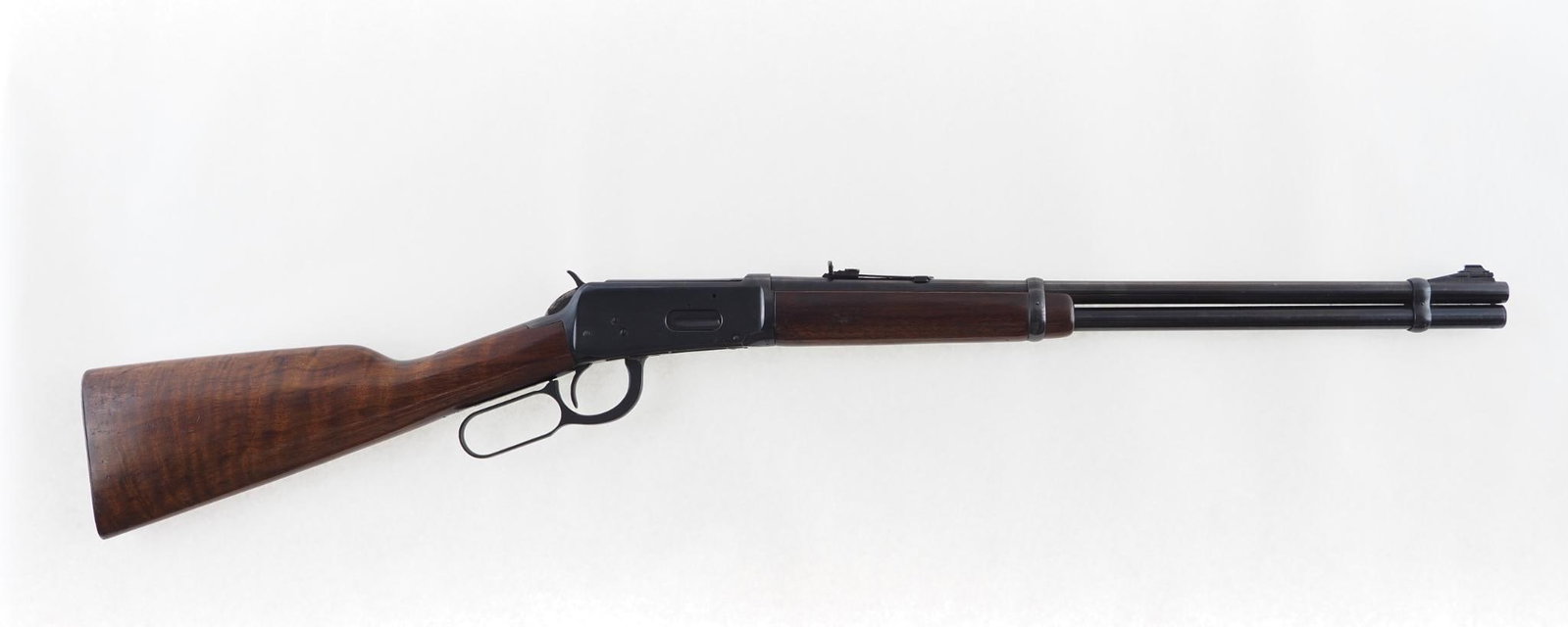 Winchester 94 Carbine: SN: 2417085 Year of Mfg: 1960 Cal: .30-30 Action Type: Lever Action Barrel Length: 20" Sights/Optics: adjustable rear sight Stock: walnut Finish: blue Finish Cond: original Bore: excellent Overall
