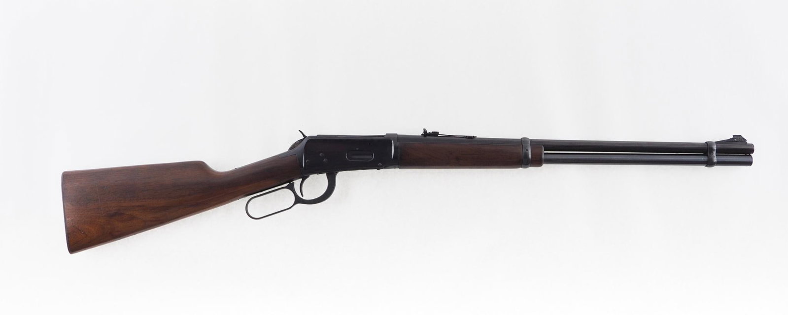 Winchester 94 Carbine: SN: 2596737 Year of Mfg: 1963 Cal: .30-30 Action Type: Lever Action Barrel Length: 20" Sights/Optics: adjustable rear sight Stock: walnut Finish: blue Finish Cond: original Bore: very good Overall