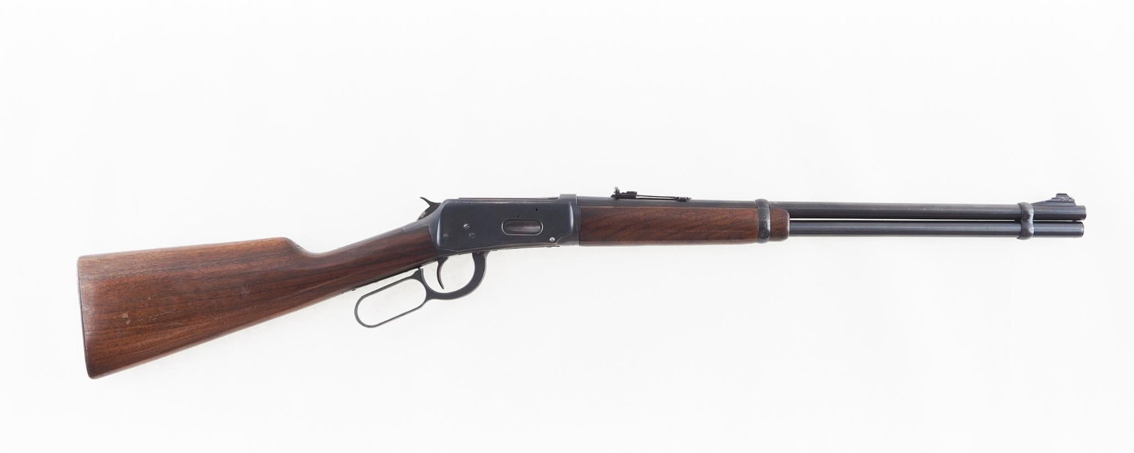 Winchester 94 Carbine: SN: 2590512 Year of Mfg: 1962 Cal: .32 Winchester Special Action Type: Lever Action Barrel Length: 20" Sights/Optics: adjustable rear sight Stock: walnut, minor finish loss and bruises Finish: blue