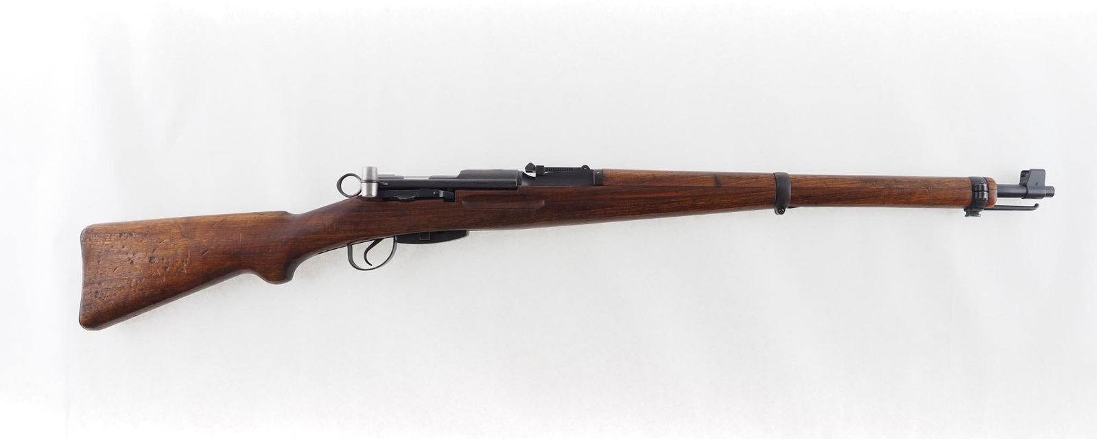 Schmidt-Rubin K31 Rifle: SN: 752054 Cal: 7.5X55 Action Type: Bolt Action Markings: Samco import mark underside of barrel near muzzle Sights/Optics: correct adjustable rear sight Stock: handling and storage marks