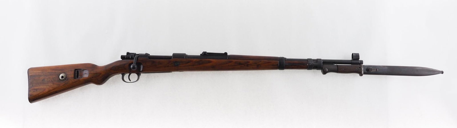 German Mauser 98 Rifle: SN: 3903 Cal: 8mm Mauser Action Type: Bolt Action Markings: "duv / 41" over breech, I. O. import mark on barrel behind muzzle, WWII German acceptance stamps on barrel near breech and on receiver left 