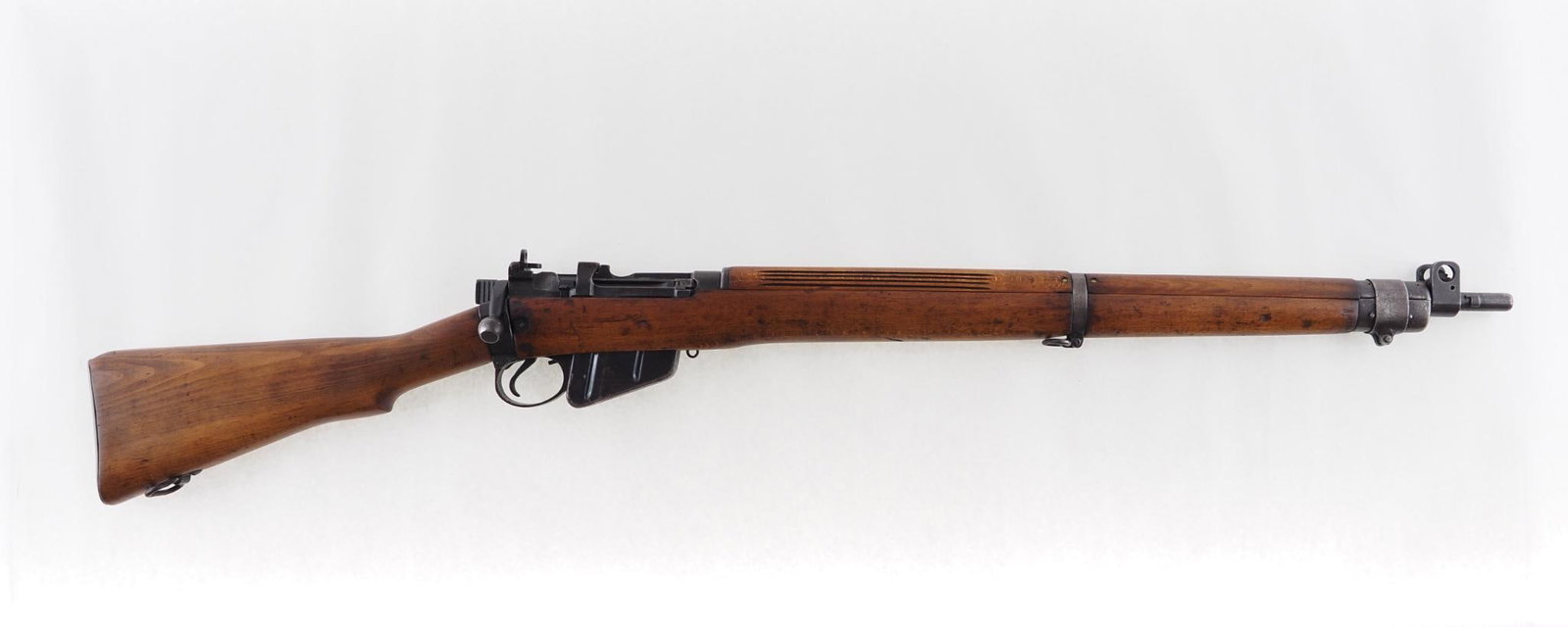 British Enfield No. 4 MK 1 Rifle: SN: CC248978A Cal: .303 British Action Type: Bolt Action Markings: CAI import mark at muzzle Stock: refinished Finish: even wear Bore: good with moderate pitting Overall Cond: good Mechanical: very