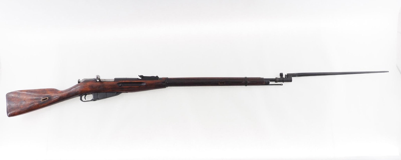Mosin Nagant 91/30 Rifle: SN: 277135 Cal: 7.62x54R Action Type: Bolt Action Barrel Length: 28" Sights/Optics: original military sights Stock: wood military stock Finish: blue Bore: corrosion Overall Cond: fair Mechanical: