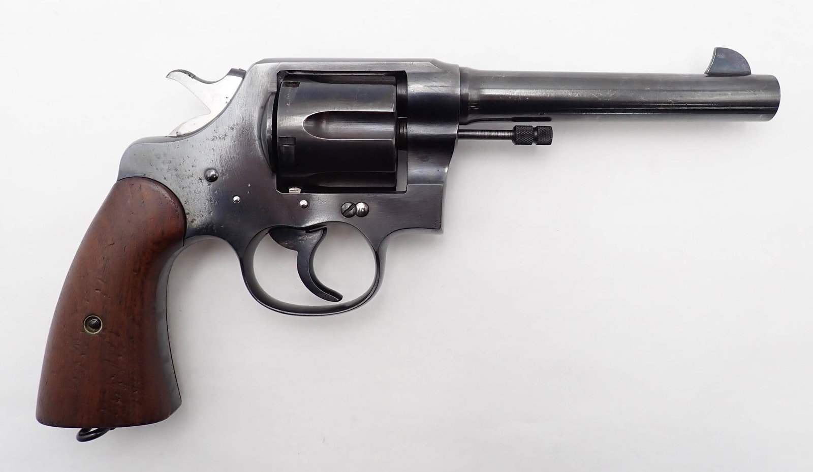 Colt U.S. Army 1917 Revolver: SN: 196233 Year of Mfg: 1919 Cal: .45 Action Type: Double Action Barrel Length: 5.5" Stock: original wood Finish: older reblue Bore: very, very light pitting Overall C