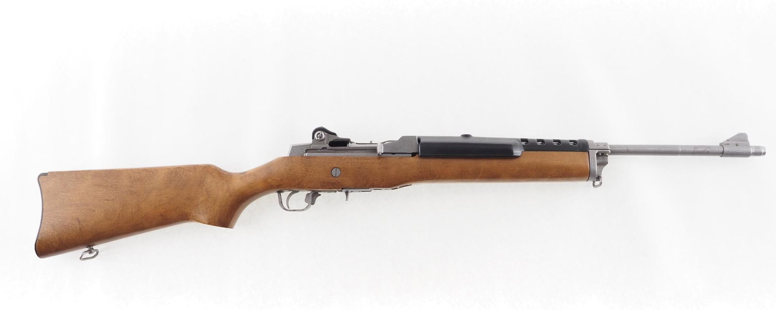 Ruger Mini 14 Rifle: SN: 186-51380 Cal: .223 Action Type: Semi-Automatic Barrel Length: 18" Sights/Optics: original open sights Stock: wood Finish: stainless steel Bore: very good Over