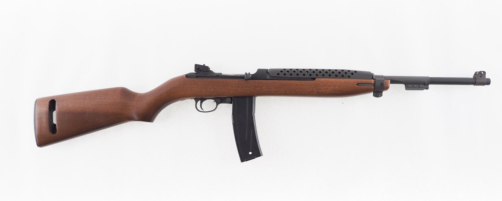 Auto-Ordnance U. S. Carbine: SN: MA0649 Cal: .30 Carbine Action Type: Semi-Automatic Barrel Length: 18" Sights/Optics: adjustable rear sight, lacking the windage knob Stock: smooth hardwood Finish: parkerized Bore: excellent