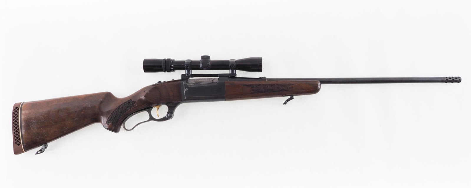 Savage 99F Rifle: SN: A217042 Year of Mfg: 1969 Cal: .243 Win. Action Type: Lever Barrel Length: 23.5" Sights/Optics: Bushnell 3-9X42 scope Stock: minor finish loss and wear Finish: blue Bore: very good / excellent