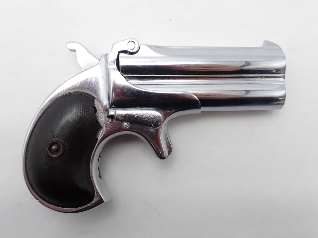 Remington 95 Double Derringer Pistol: SN: 1344 Cal: .41 RF Action Type: Over / Under Barrel Length: 3" Stock: checkered hard rubber, (1) damaged Finish: refinished in nickel Bore: moderate pitting Overall Cond: good Mechanical: fine