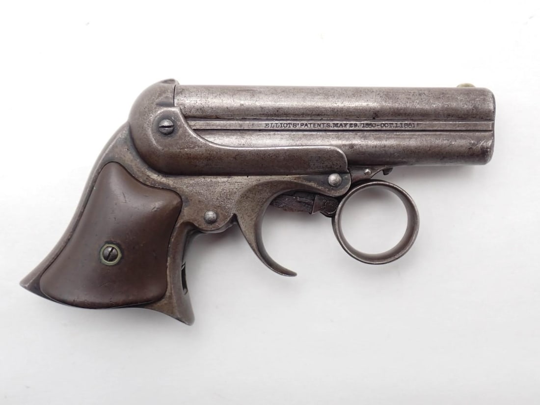 Remington Elliot Pepperbox Pistol: SN: 6762 Cal: .32 RF Barrel Length: 3.375" Stock: smooth hard rubber Finish: mostly bare with traces of blue Bore: moderate pitting Overall Cond: good Mechanical: fine
