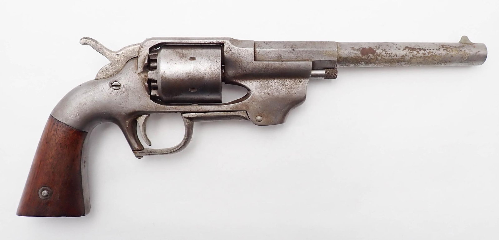Allen & Wheelock Center Hammer Army Percussion Revolver: SN: 297 Cal: .44 Action Type: Single Action Barrel Length: 7.625" Stock: smooth hardwood Bore: moderate even pitting Overall Cond: fair Mechanical: cylinder turns but does n