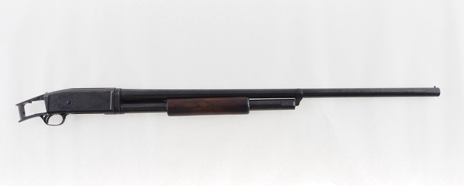 Remington 10 Shotgun: SN: U43210 Cal: 12 Ga. Action Type: Slide Barrel Length: 29.75" Sights/Optics: bead front Stock: lacking the stock Finish: blue with wear Bore: bright, moderately pitted Overall Cond: fair / good