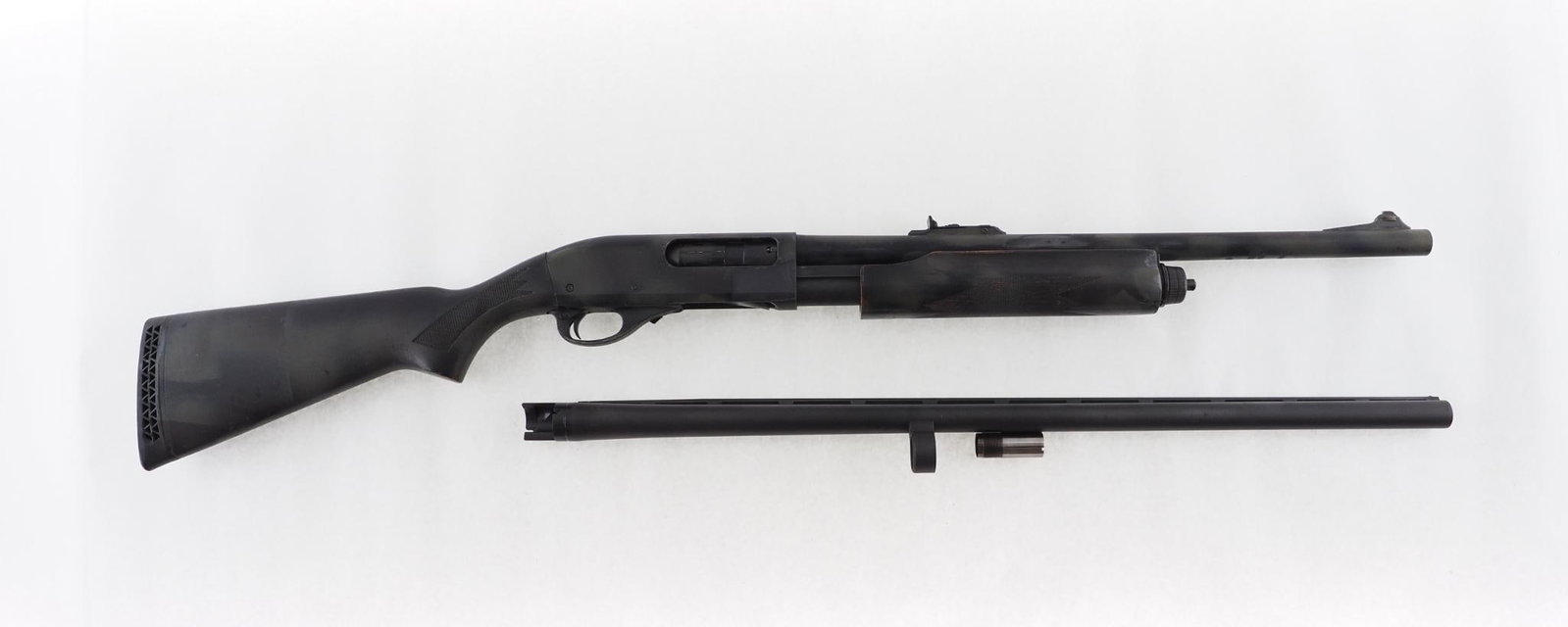 Remington 870 Super Express Magnum Shotgun: SN: C517493A Cal: 12 Ga. Action Type: Slide Barrel Length: 20" Sights/Optics: adjustable iron Stock: painted camo Finish: painted camo Bore: very good Overall Cond: