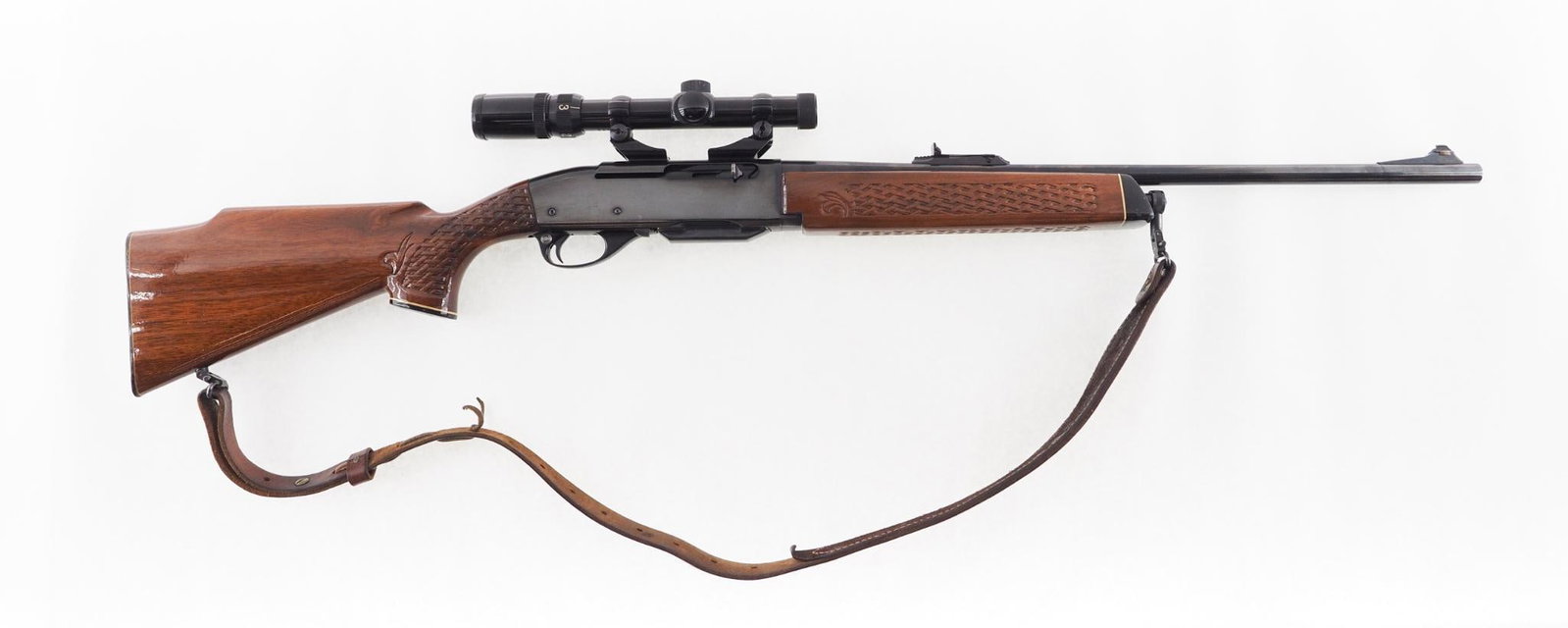 Remington 742 Woodsmaster Rifle: SN: 7255891 Cal: .30-06 Action Type: Semi-Automatic Barrel Length: 22" Sights/Optics: Bushnell Banner 1.5-4X scope Stock: basket weave pattern walnut with light handling marks Finish: strong blue