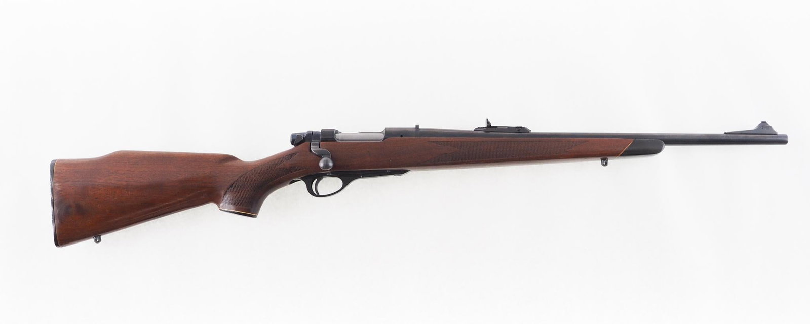 Remington 660 Rifle: SN: 106845 Cal: .243 Win. Action Type: Bolt Action Barrel Length: 20" Sights/Optics: adjustable rear sight Stock: checkered walnut Finish: strong blue Bore: very good with very, very light scattered