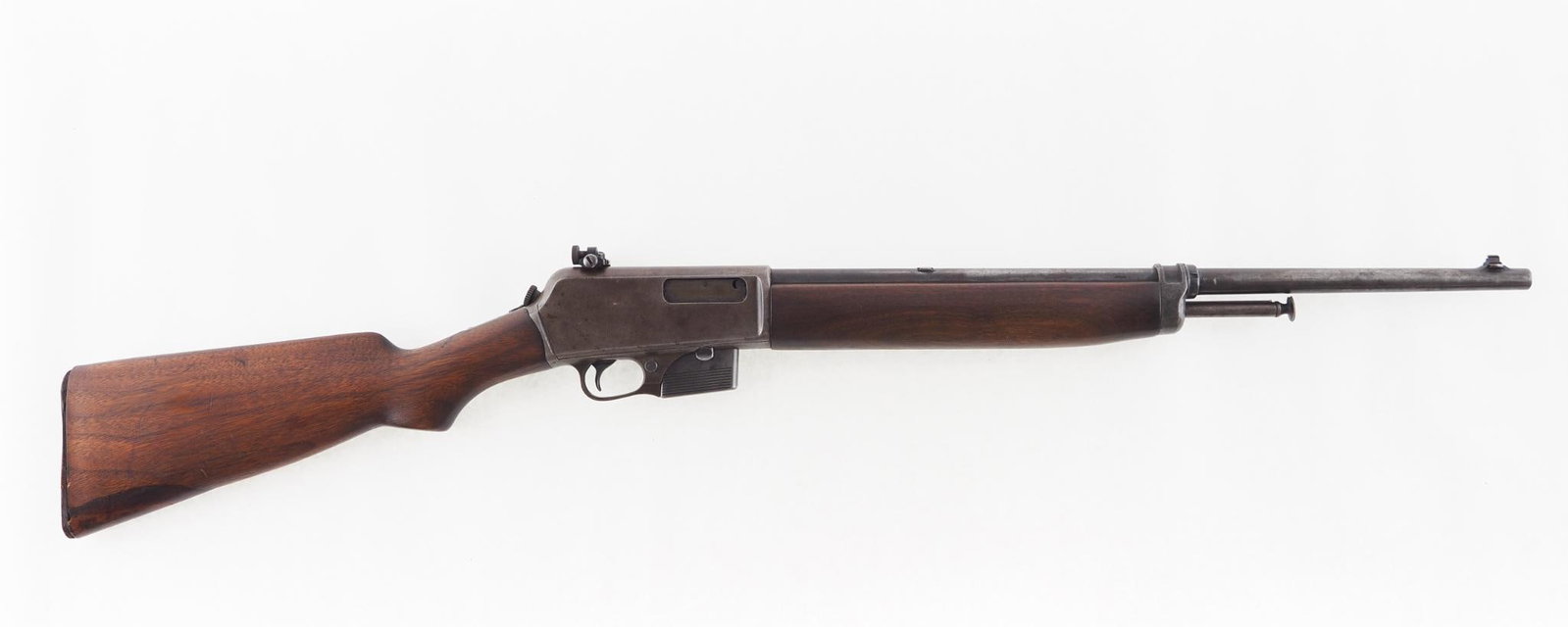 Winchester 1907 Rifle: SN: 37758 Year of Mfg: 1916 Cal: .351 SLR Action Type: Semi-Automatic Barrel Length: 20" Sights/Optics: Lyman receiver sight Stock: walnut, toe of butt stock repaired Finish: blue turning plum Finish
