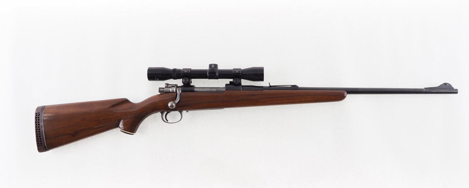 FN J. C. Higgins 50 Rifle: SN: 33938 Cal: .30-06 Action Type: Bolt Action Barrel Length: 22" Sights/Optics: Tasco 4X32 scope Stock: smooth walnut Finish: strong blue Bore: excellent Overall Cond: very good Mechanical: fine,