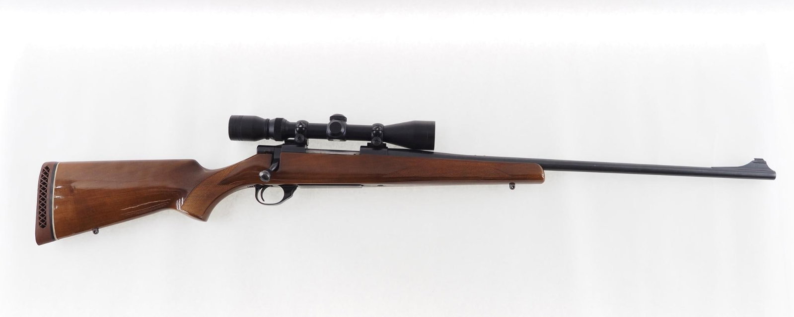 Smith & Wesson 1500 Rifle: SN: PN47774 Cal: .300 Win. Mag. Action Type: Bolt Action Barrel Length: 24" Sights/Optics: Gander Mountain 3-9x scope Stock: checkered walnut Finish: strong blue Bore: very good with very light