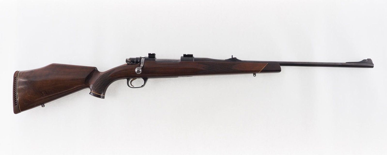 Voere Imperial Rifle: SN: Z-71876 Cal: .30-06 Action Type: Bolt Action Barrel Length: 22" Sights/Optics: Weaver scope bases, express iron sights Stock: checkered walnut with light handling marks Finish: strong blue Bore: