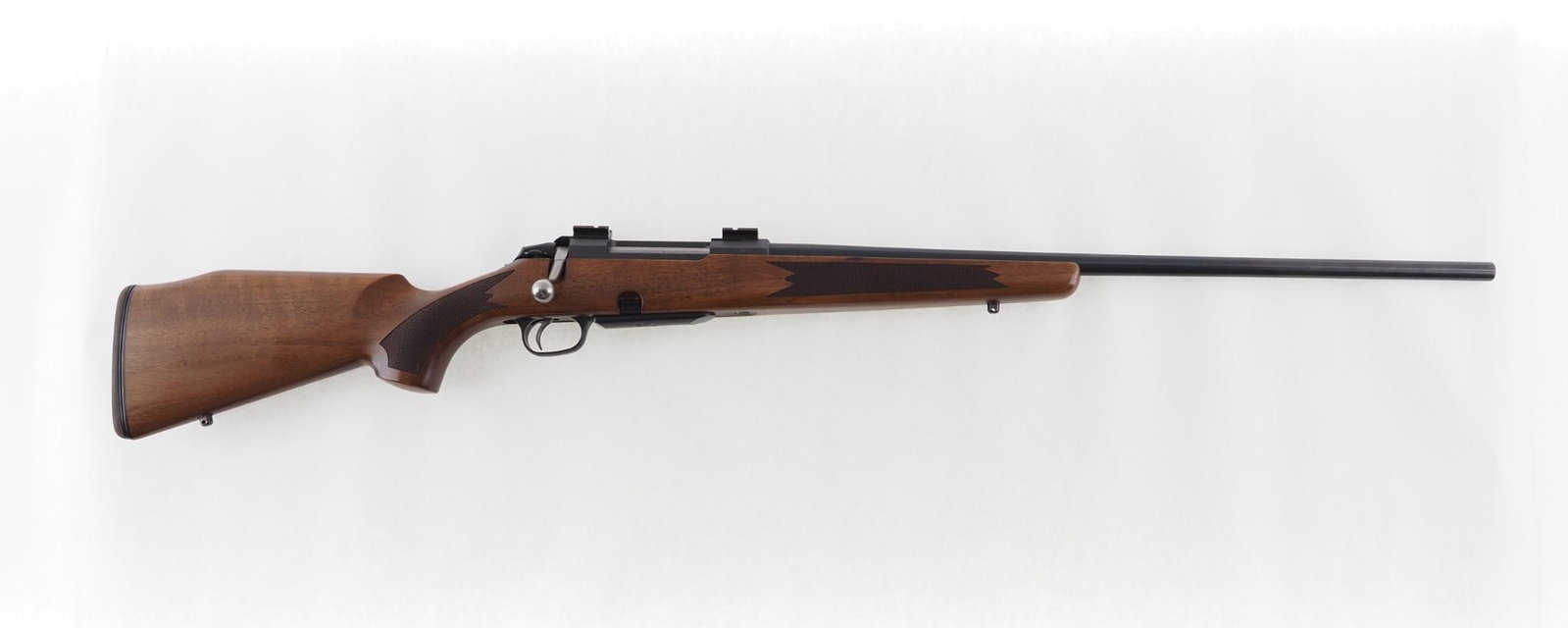 Tikka M695RH Rifle: SN: 898786 Cal: 7mm Rem. Mag. Action Type: Bolt Action Barrel Length: 24.25" Sights/Optics: Weaver scope bases Stock: checkered walnut Finish: strong blue Bore: excellent Overall Cond: excellent