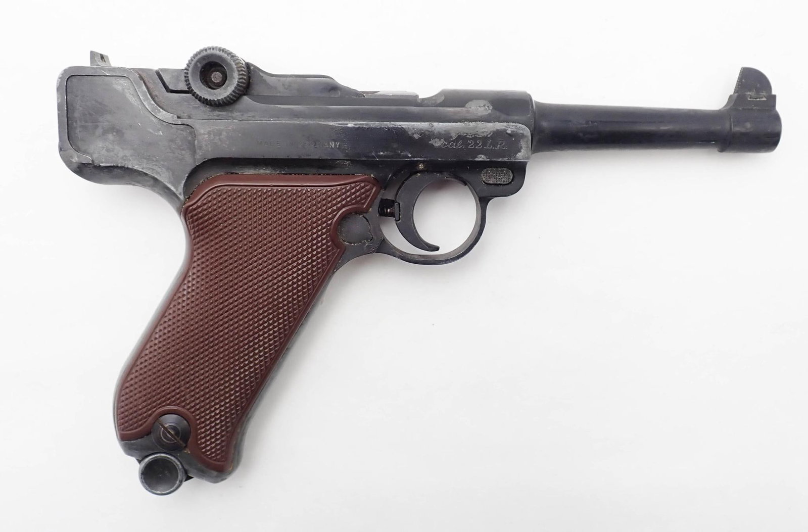 Erma EP22 "Luger" Pistol: SN: 02419 Cal: .22 LR Action Type: Semi-Automatic Barrel Length: 4.5" Bore: good / very good Overall Cond: fair Mechanical: fine Box/Papers/Acc: with (1) magazine and a leather holster that doesn't