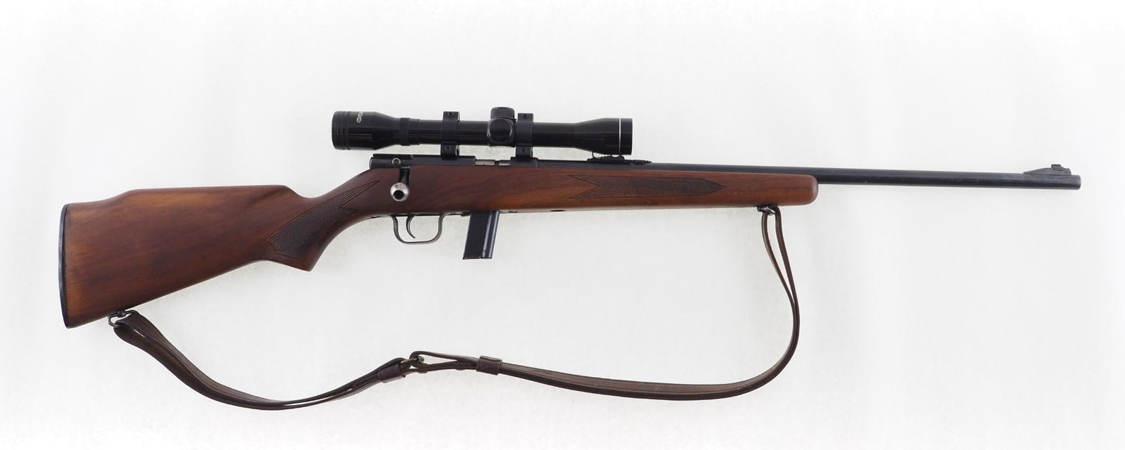 Winchester Model 320 Rifle: SN: D14380 Cal: .22 LR Action Type: Bolt Action Barrel Length: 22" Sights/Optics: factory open sights, Tasco 4 power scope Stock: checkered walnut Finish: blue Bore: very good Overall Cond: very good