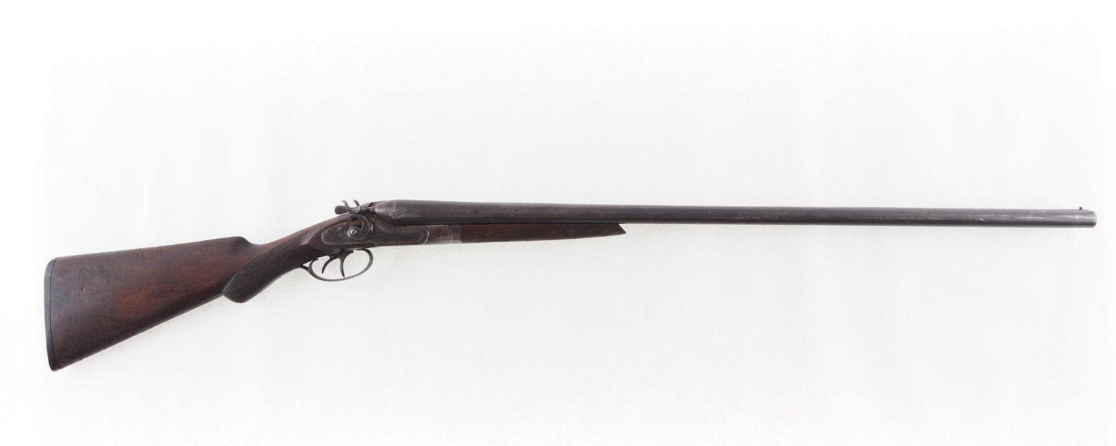 Hibbard, Spencer, Bartlett & Co. Shotgun: SN: 190540 Cal: 12 Ga. Action Type: Side by Side Barrel Length: 30" Sights/Optics: bead front Stock: checkered walnut, shows wear Finish: receiver shows traces of case color, barrels have brown