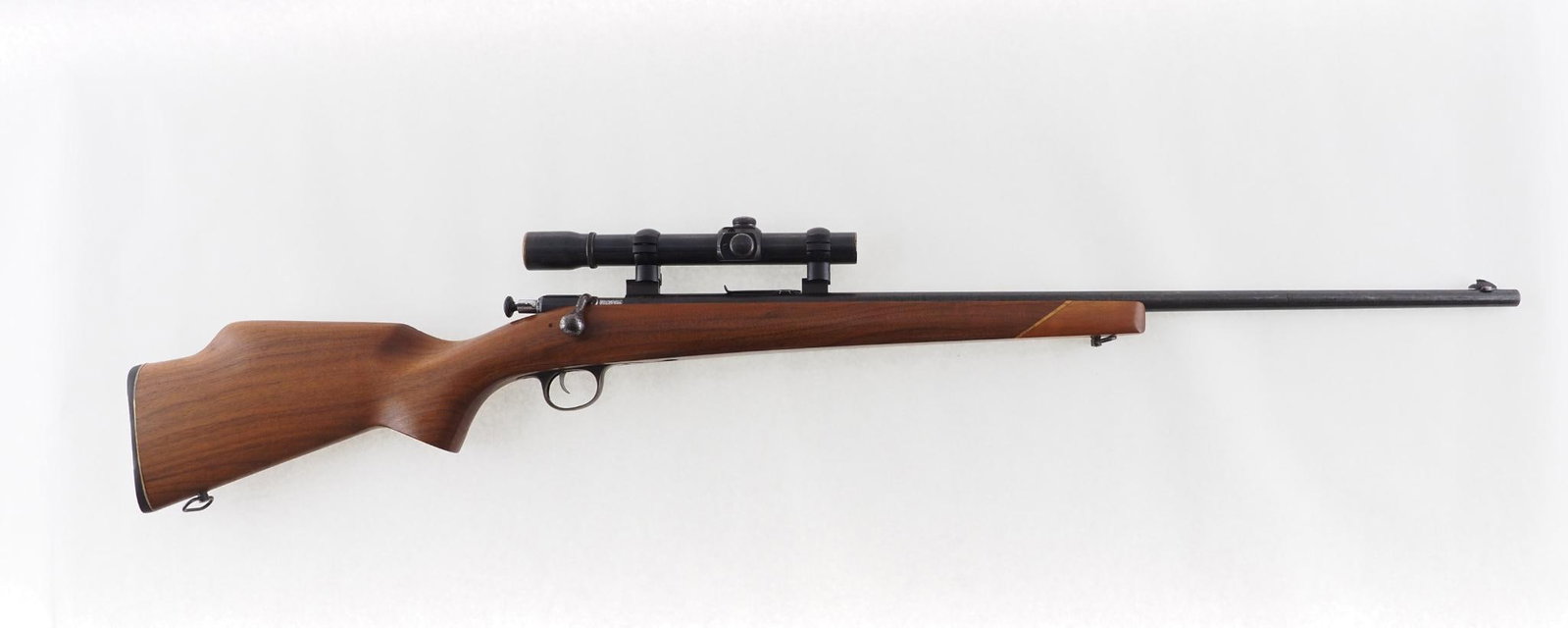 Winchester Model 67 Rifle: SN: no s.n. Cal: .22 LR Action Type: Bolt Action Barrel Length: 26" Sights/Optics: open sights, rear elevator missing, Weaver K2.5 scope Stock: wood replacement stock Finish: blue with freckling