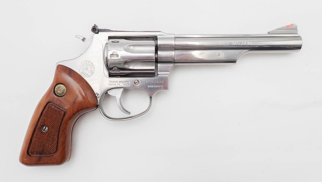 Taurus Model 941 Revolver: SN: OF84937 Cal: .22 magnum Action Type: Double Action Barrel Length: 5" Sights/Optics: adjustable sights Stock: checkered walnut Finish: nickel Bore: excellent