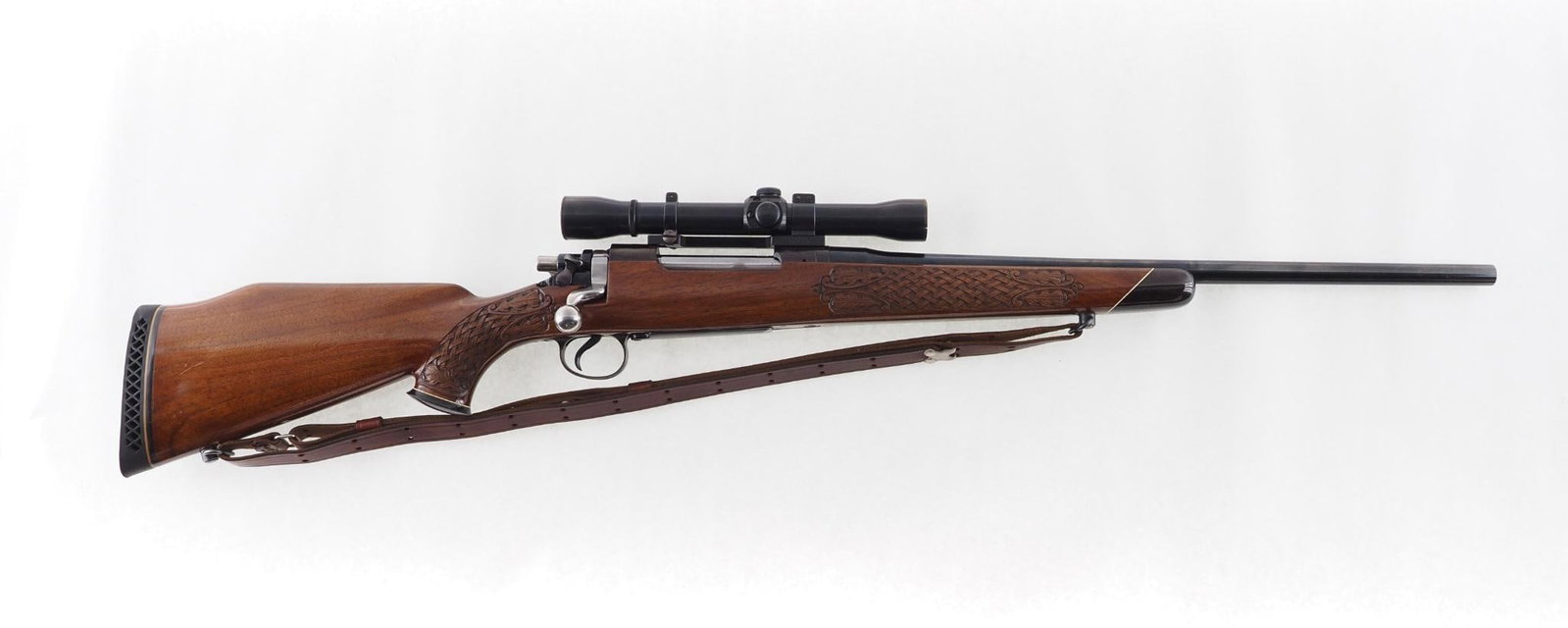 Remington 1917 Sporter Rifle: SN: 90366 Cal: .30-.06 Action Type: Bolt Action Barrel Length: 20.5" Sights/Optics: Weaver K4 Scope Stock: checkered walnut stock with rosewood forend Finish: blue Bore: very good Overall Cond: very