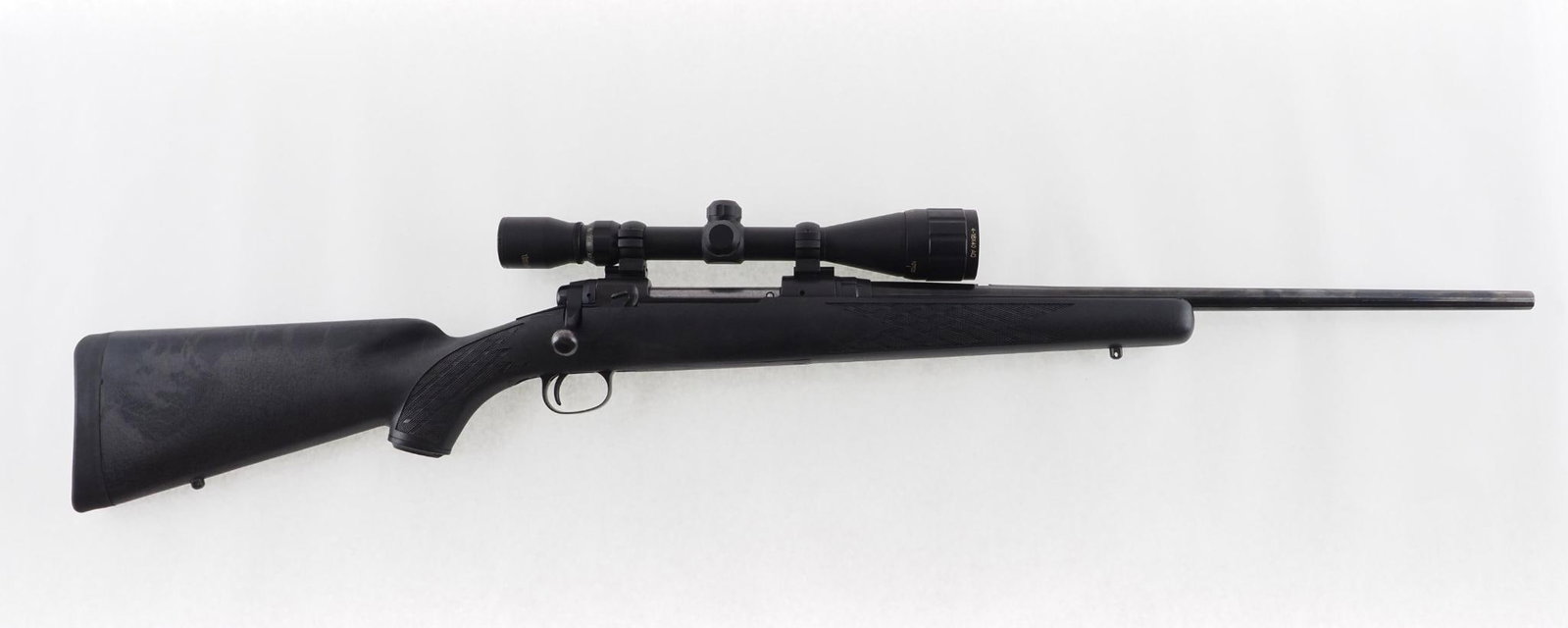 Stevens 110E Rifle: SN: 0610069 Cal: .30-06 Action Type: Bolt Action Barrel Length: 21" Sights/Optics: no sights, Tasco World Class 4-16 scope Stock: synthetic Finish: blue, thinning on barrel Bore: frosted Overall