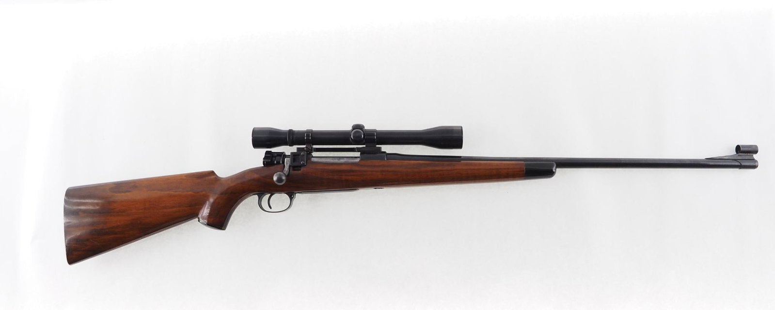 CZ VZ24 Sporter Rifle: SN: 8118C3 Cal: .300 Winchester Mag Action Type: Bolt Action Barrel Length: 24" Sights/Optics: Weaver K6 Scope Stock: walnut with rosewood forend Finish: blue Bore: very slight pitting Overall Cond:
