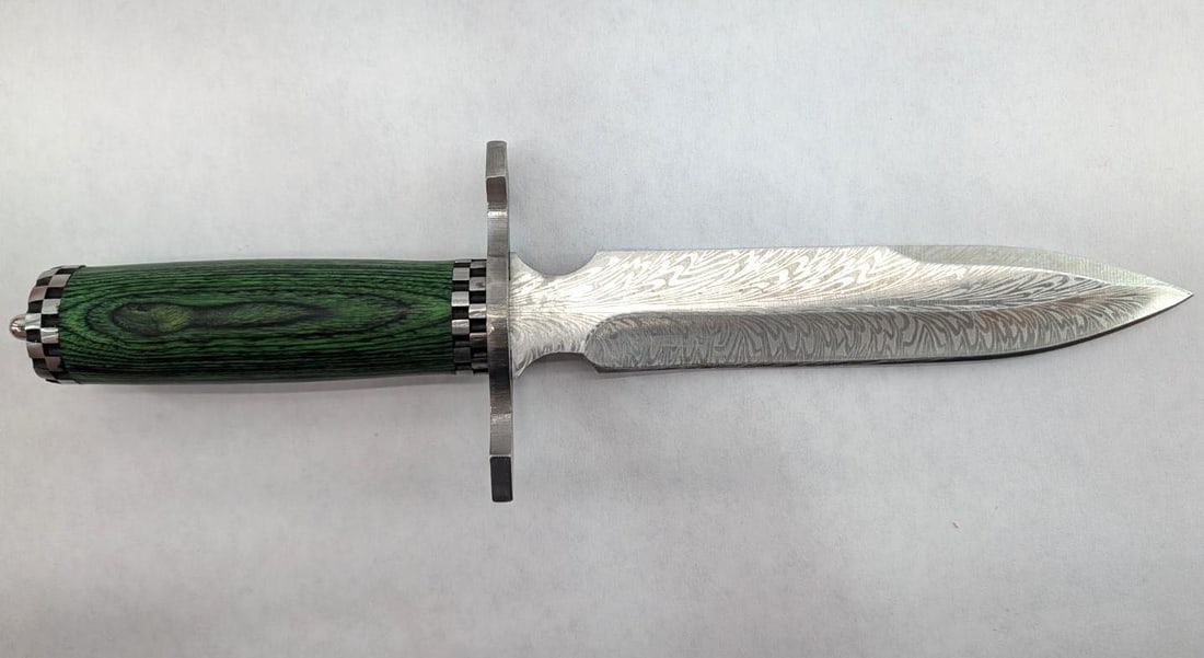 Boot Knife or Dagger: 11.75" overall length, with handmade leather sheath