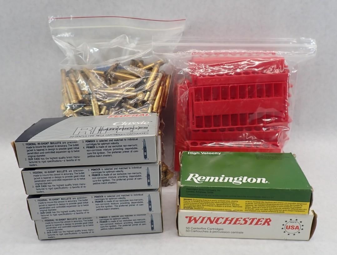 Large Qty. of 303 British Brass: incl. bag of plastic cartridge holders,(1) large bag of brass and (5) boxes (some boxes only partially full), box of 37 once fired auto brass