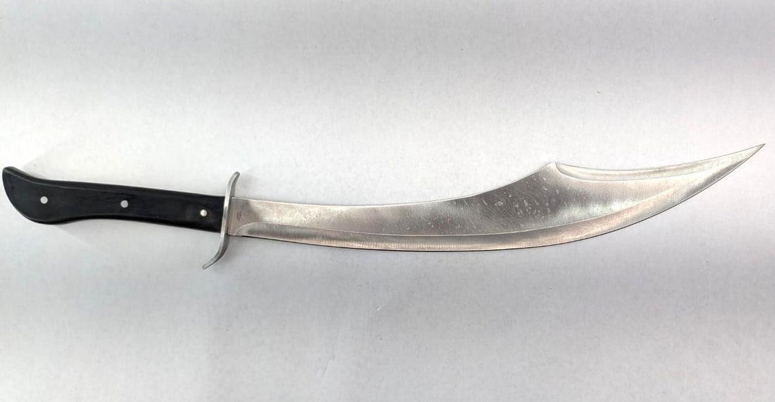 Stainless Steel Scimitar: 25" overall length, with handmade leather sheath