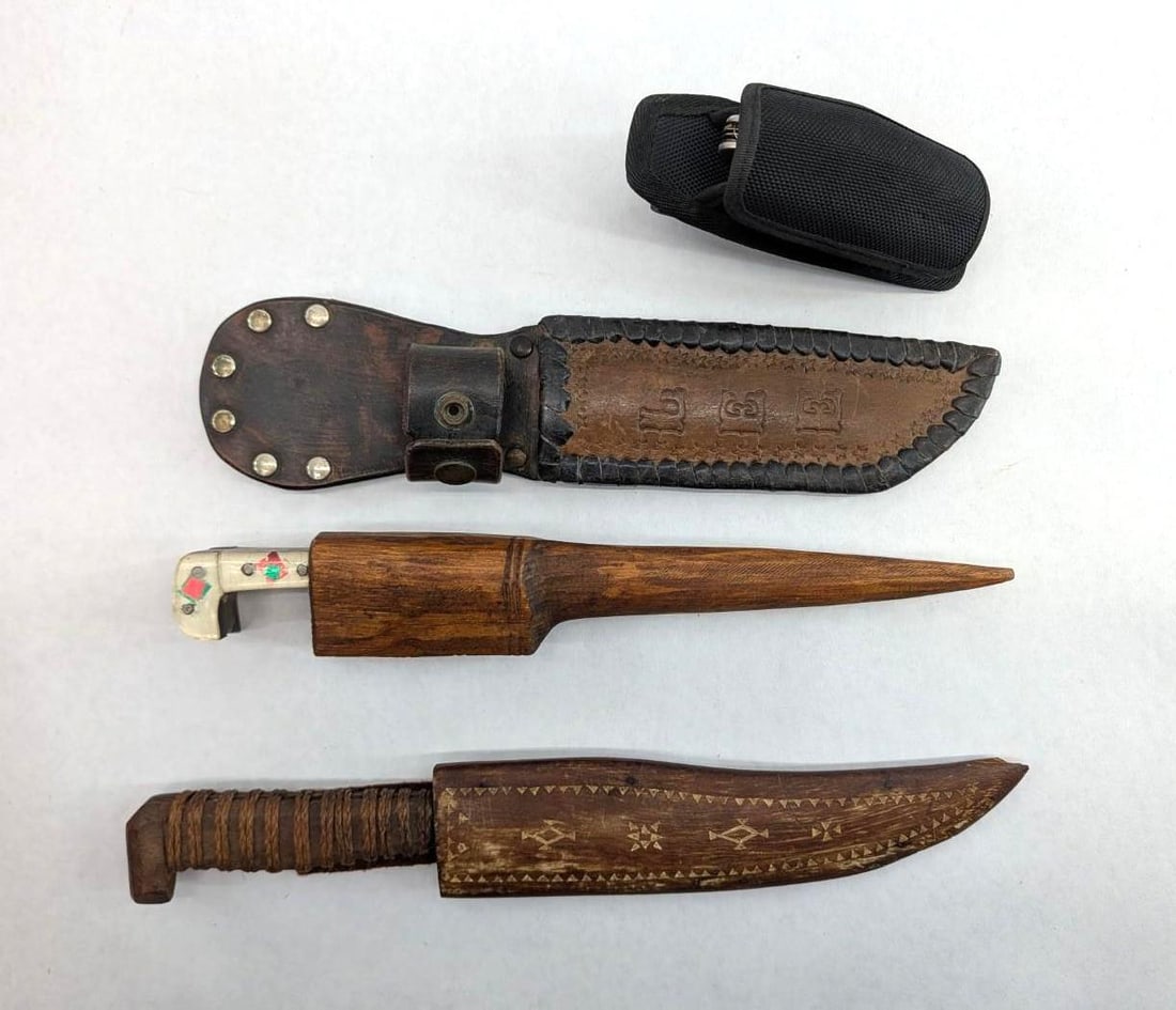 (2) Vintage Foreign Fixed Blade Knives: with wood scabbards, 12.5" & 11.25" overall length; with a folding camp knife and a tooled leather fixed blade knife sheath