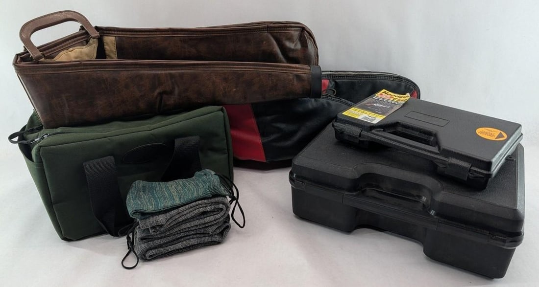 Gun Cases: incl.: (8) long gun cases and socks; Docksil hard case; Remington range bag