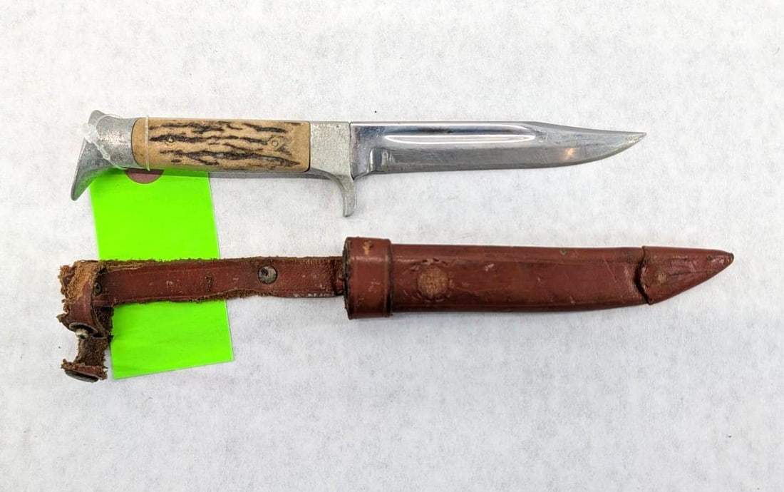 Vintage Hoffritz Stag Handle Fixed Blade Knife W/ Leather Sheath: overall length 7 7/8", sheath shows damage and wear