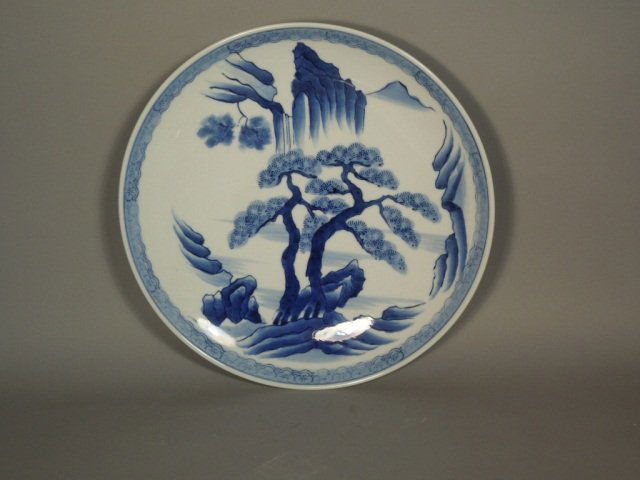 Japanese Blue and White Porcelain Charger: Old Estate Japanese blue and white charger with mark to back. Measures 12 ". Good condition.