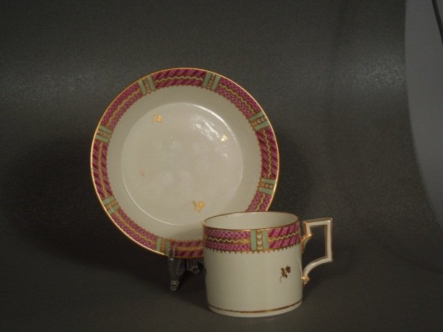 Fine English Coffee Can & Saucer Circa 1810: Fine Quality early 19th century Coffee Can and saucer with the makers Mark. Made by one of the important porcelain makers Circa 1800-20. These all came from the Wagner Estate. Minor flakes.