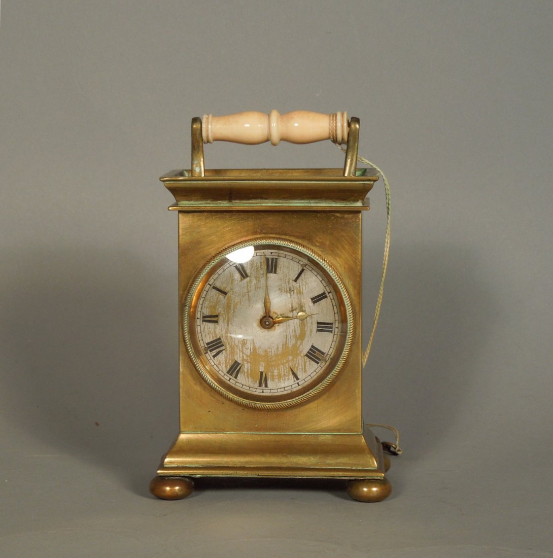 Brass and Ivory 19th Century Carriage Clock: All original 19th century signed brass and Ivory carriage clock. Good condition. Measures 5 1/4" tall.