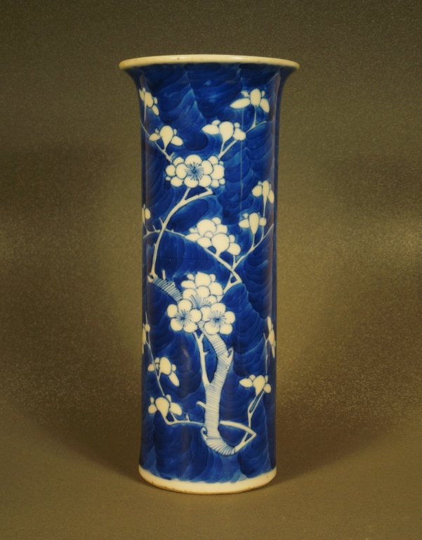 Antique B/W Chinese Cracked Ice Prunus Beaker Vase: Beautiful antique Chinese blue and white 19th century cracked ice and prunus beaker vase; with a 4 character mark; measures 8 1/4" tall. This represents the blossom of spring against the " cracked ice