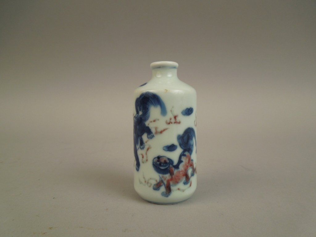 Antique Chinese Porcelain Marked Snuff Bottle: Fine Chinese antique blue and white with red snuff bottle; good under glaze blue character marks; measures 3 1/4"; We have quite a few snuff bottles from the Wagner estate collection that we are listi