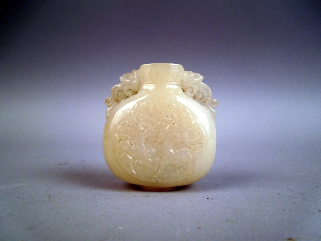Antique Chinese White Jade Snuff Bottle: Fine quality Chinese antique white Jade snuff bottle; measures 2"; We have quite a few snuff bottles from the Wagner estate collection that we are listing.