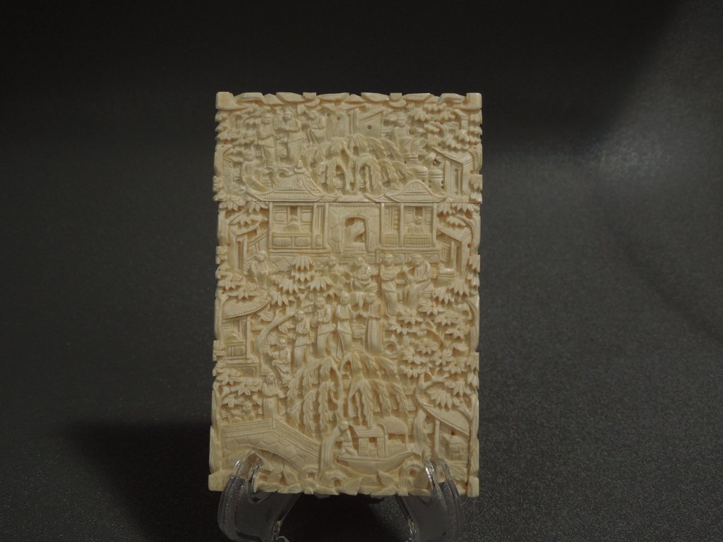Chinese Ivory 19th c. Canton Carved Card Case: Fine quality large Chinese ivory 19th century Canton carved card case with three-dimensional superb carving throughout.; dating from the 1800s; measures 4 3/8" by 3". International shipping is not ava