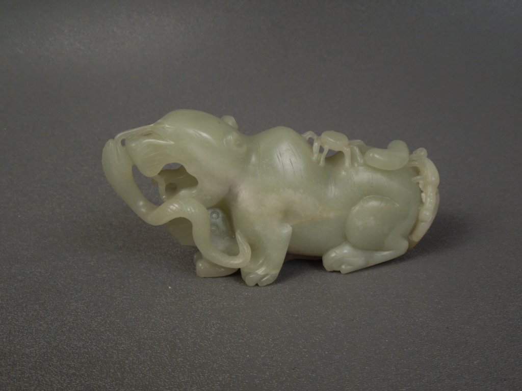 Chinese White Jade Figure of a Foo Dog: Chinese white Jade figure of a Foo Dog with very good detail and color; measures 5 3/8"; weight 438 grams.