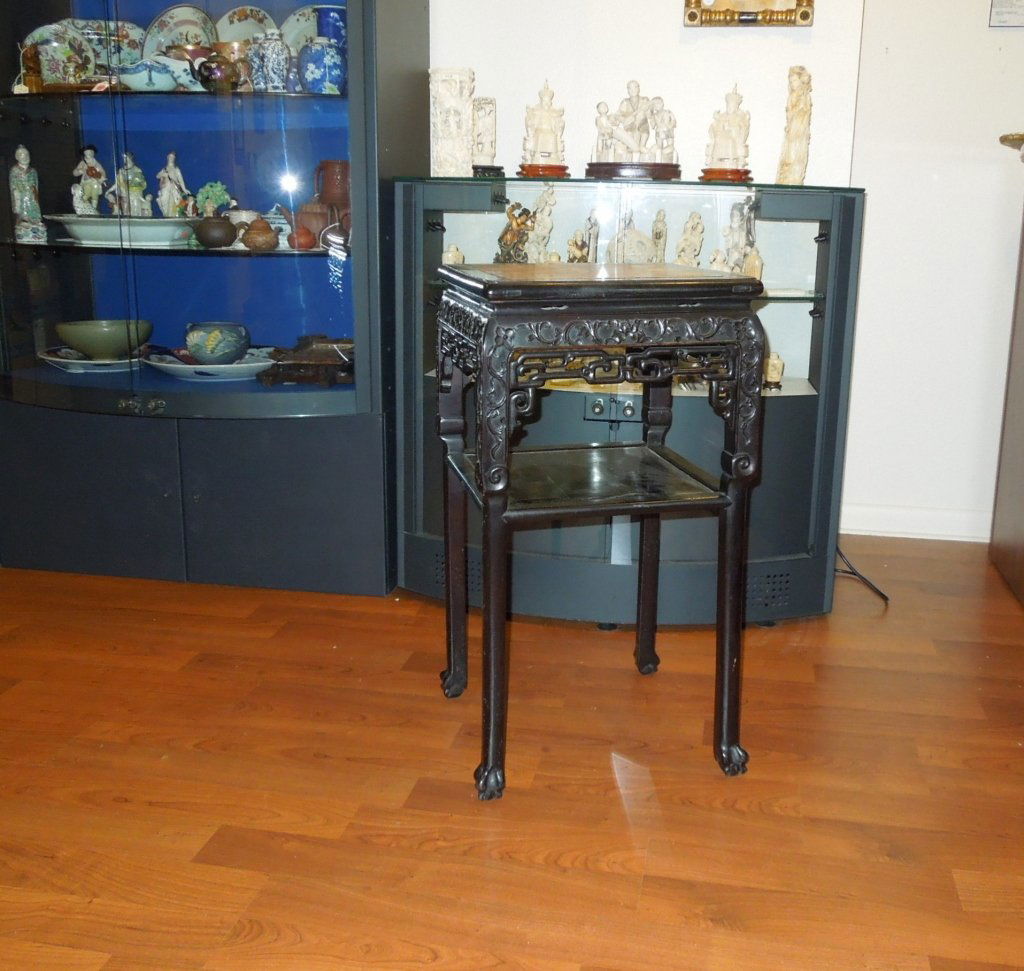Fine Chinese 19th C. Rosewood Table: Fine Chinese 19th c. Rosewood Table with a pink marble top insert; delicate ball and claw feet along with a intricate carved apron; original patina; measures 32" x 16 1/2 w.