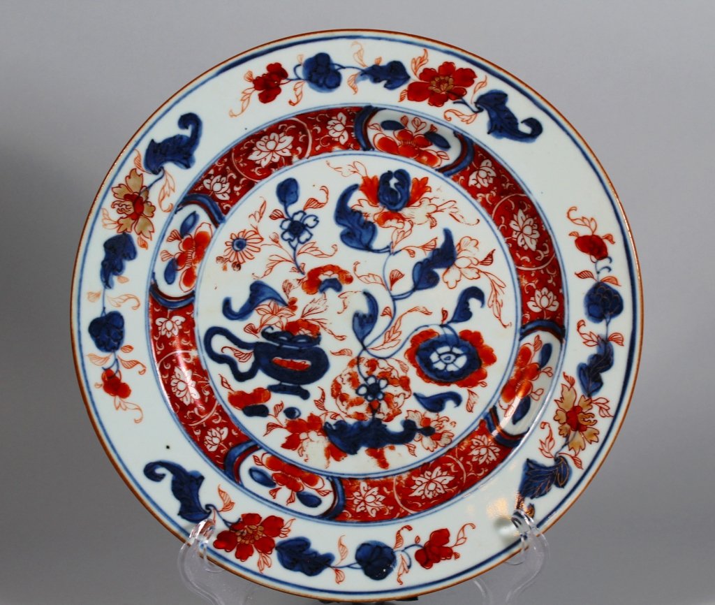 Antique Chinese Imari Qianlong Period Plate: 18th century Chinese Imari plate; fine quality under-glaze blue and iron red painting with gold accents; measures 8 7/8" d.