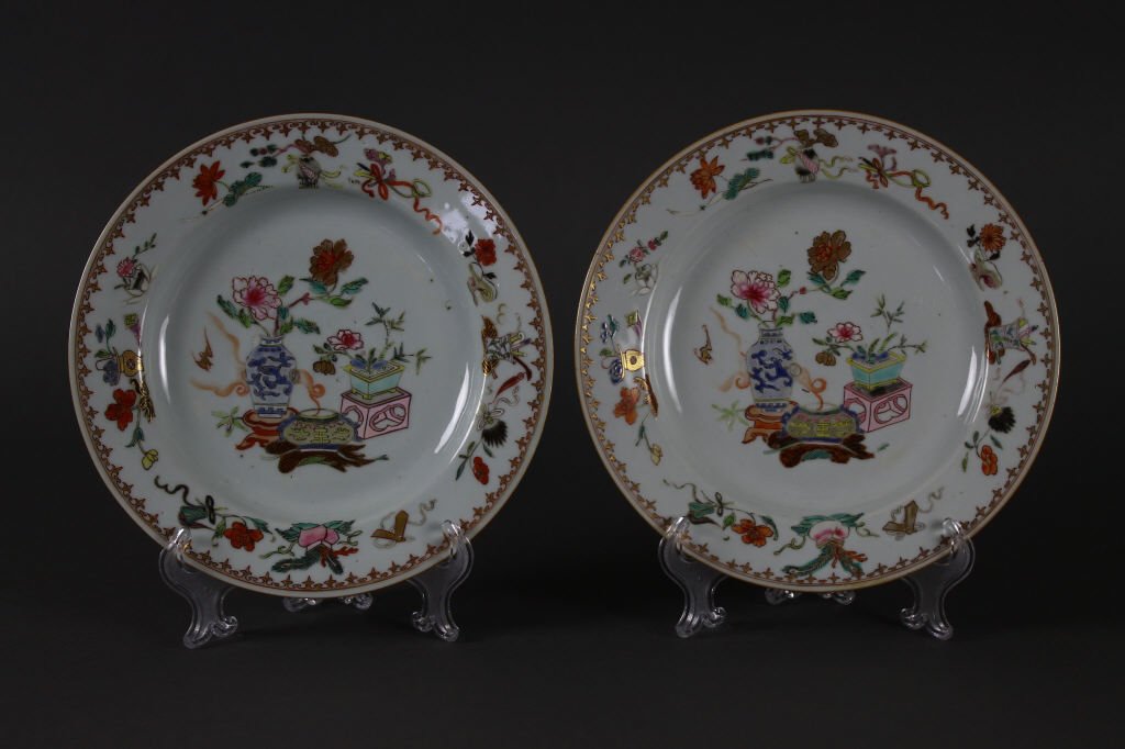Two 18th c. Chinese Export Plates: Pair of Early 18th Century Chinese Export plates with very nice decoration of vases and flowers with a lot of beautiful gold highlighting; and a spear head border. circa 1740; they measure 23 cm / 9 i